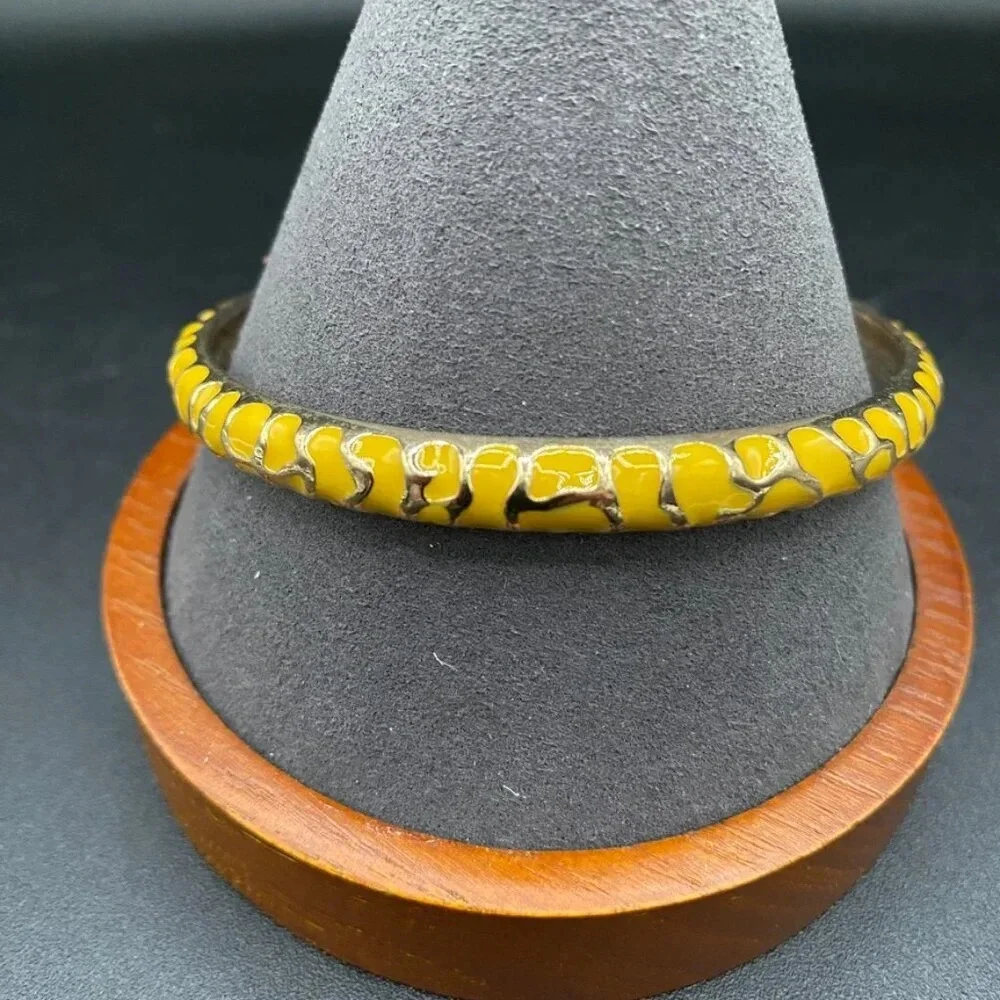 Gold enamel stacking bangle bracelet set in gold tone